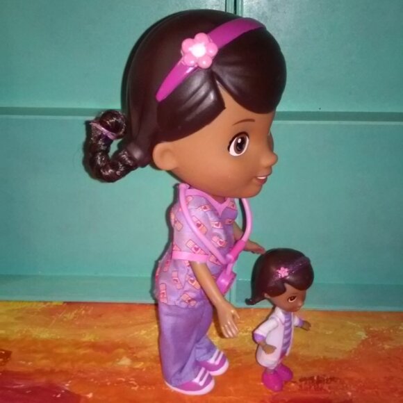 Doc Mcstuffins Doll in purple & pink  scrubs with a mini doc - Picture 3 of 8